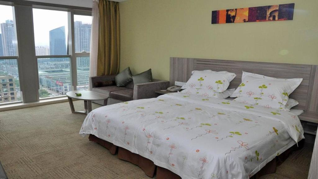 Manju Hotel Shaoxing Keqiao Wanda Номер фото