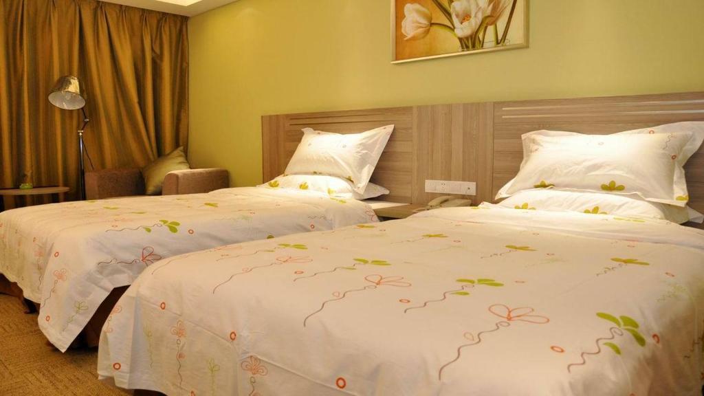 Manju Hotel Shaoxing Keqiao Wanda Номер фото