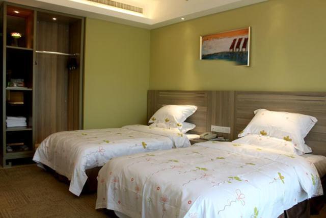 Manju Hotel Shaoxing Keqiao Wanda Номер фото